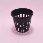 Round hydroponic culture basket from Monark Dimension, 5 cm diameter, with visible mesh sides for plant root support.