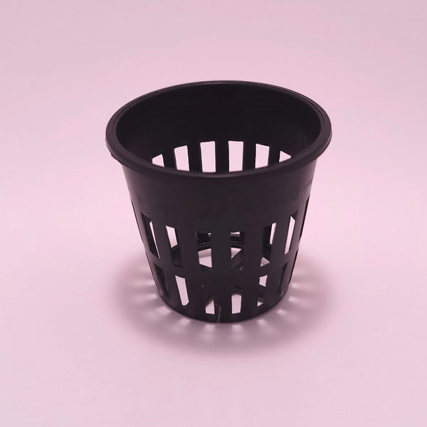 Round hydroponic culture basket from Monark Dimension, 5 cm diameter, with visible mesh sides for plant root support.